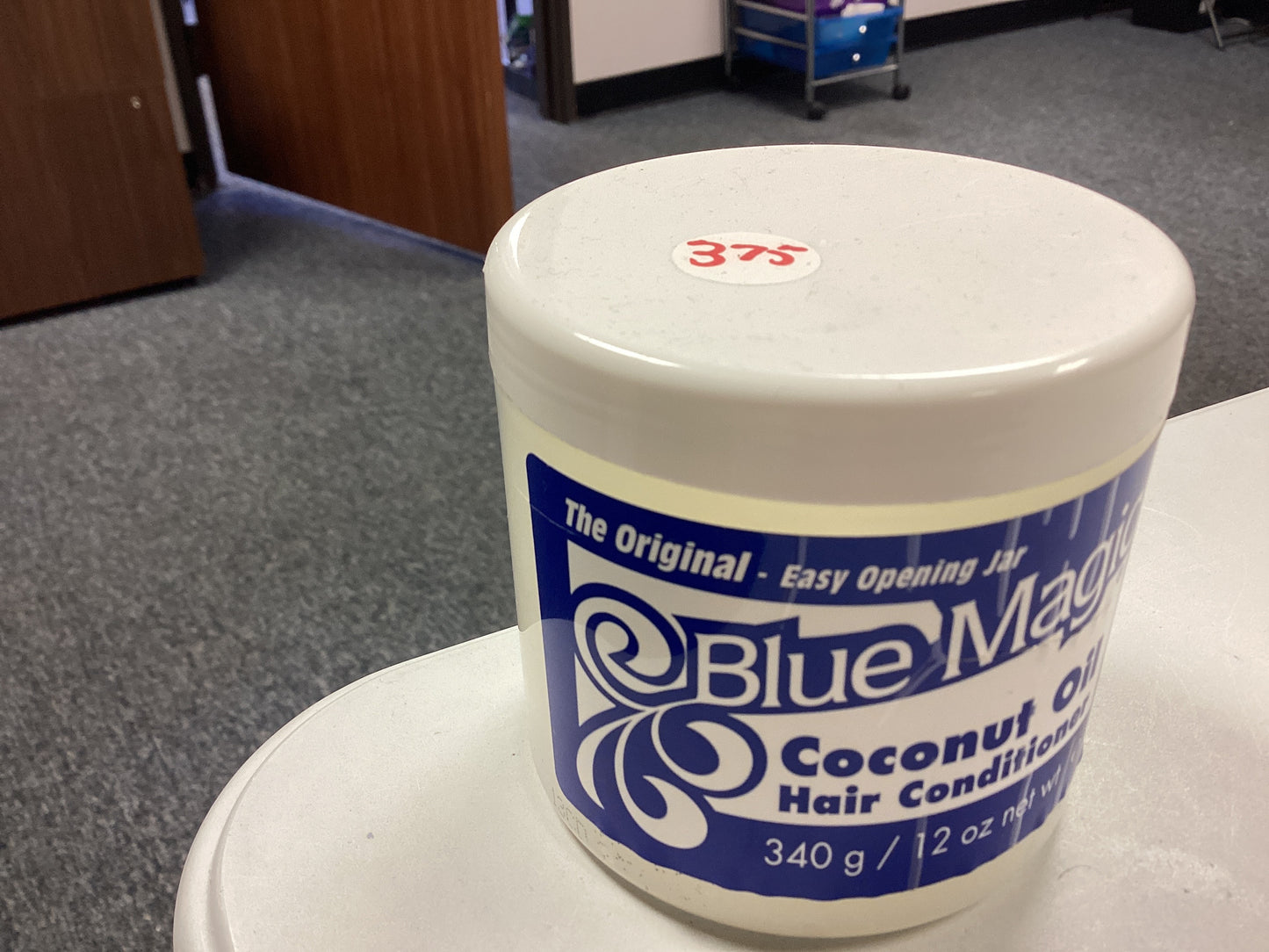 Blue Magic hair grease (coconut oil)